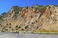 Red, rocky mountain cliffs along the road cars Kemer - Antalya in Turkey