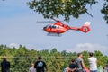 Red Romanian emergency services helicopter at Iasi rally event in the sky