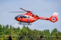 Red Romanian emergency services helicopter at Iasi rally event in the sky