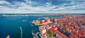 Red roof buildings in Sottomarina port.