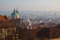 The red roof in Prague. Panoramic view of Prague in winter day with dense fog in the city. Royalty Free Stock Photo