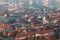 The red roof in Prague. Panoramic view of Prague in winter day with dense fog in the city. Royalty Free Stock Photo