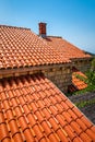 Red roof tile pattern under blue sky Royalty Free Stock Photo