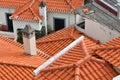 Red roof tiles with chimneys Royalty Free Stock Photo