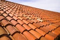 Red roof tiles closeup real with sky background