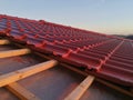 Red roof tiles under construction Royalty Free Stock Photo