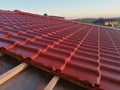 Red roof tiles under construction Royalty Free Stock Photo