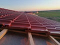 Red roof tiles under construction Royalty Free Stock Photo