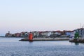 Red roofs of the historical center of old town Piran with beautiful lighthouse against the sunrise sky and Adriatic sea. Royalty Free Stock Photo