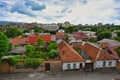 Red roofs of the residential buildings in Vladikavkaz city