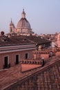 Red roofs of Rome, sights of the old city of Roma photographed at the sunrise