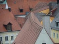 Red roofs of a small Bavarian village. crooked slate gables over the roofs of a German village. Red roof tiles from above. Royalty Free Stock Photo