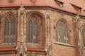 the red roofs and towers of the cathedral are very tall