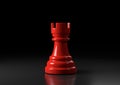 Red rook chess, standing against black background