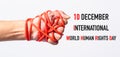 Red rope on lift hand with 10 december international HUMAN RIGHTS DAY text Royalty Free Stock Photo