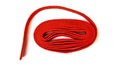 Red rope on white background. Fabric rope in red color folded in a coil Royalty Free Stock Photo