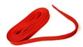 Red rope on white background. Fabric rope in red color folded in a coil Royalty Free Stock Photo