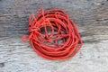 red rope on wooden background Royalty Free Stock Photo