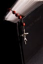 Red rosary and holy bible Royalty Free Stock Photo