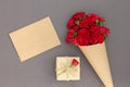 Red rose bouquet wrapped vintage craft paper