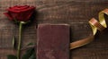 Red rose, catalan flag and old book Royalty Free Stock Photo