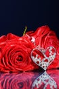 Red rose decorated with jewelry