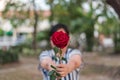 Red rose flower with human hand in Valentine& x27;s Day