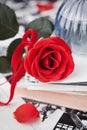 Red Rose Flower With A Stack Of Postcard, Retro Photos And Vintage Book