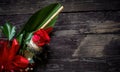 Red rose flower on vintage wooden background