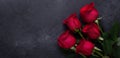 Red Rose Flowers Bouquet On Black Stone Background Valentine`s Day Greeting Card Copy Space Horizontal Banner