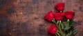 Red rose flowers bouquet on wooden background Valentine`s day greeting card Copy space Top view Royalty Free Stock Photo