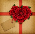 Red rose flowers heart and a ribbon with tag Royalty Free Stock Photo