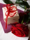 Red rose and gift box