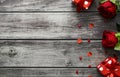 Red rose, gift box and heart on wooden background with copy space for text. Top view valentine day concept Royalty Free Stock Photo