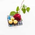 Red rose with handkerchief and chocolate Ball Royalty Free Stock Photo