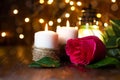 Red rose and lantern with lights on a wooden table Royalty Free Stock Photo