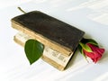 Red rose in the old book Royalty Free Stock Photo