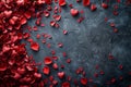 Red rose petals on a grey surface with copy space. Concept of love and romance Royalty Free Stock Photo