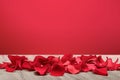 Red rose petals on wooden floor background Royalty Free Stock Photo