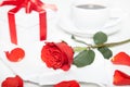Red rose, present box and cup of coffee Royalty Free Stock Photo