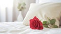 red rose on white bed generated by AI tool Royalty Free Stock Photo