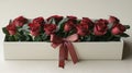 Red roses arranged in a luxurious white box Royalty Free Stock Photo