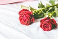 Red roses on bed background Royalty Free Stock Photo