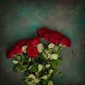 Red roses bouquet dark stone background Festive arrangement Royalty Free Stock Photo