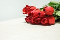 Red roses bouquet on a table , from right upper quadrant view