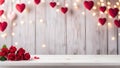 Red roses bouquet on wooden table with a blurred festive bokeh background.Valentine\'s Day,Love wedding banner Royalty Free Stock Photo