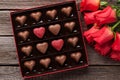 Red roses and chocolate box Royalty Free Stock Photo