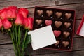 Red roses and chocolate box Royalty Free Stock Photo