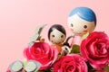 Red roses and doll Royalty Free Stock Photo