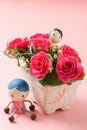 Red roses and doll Royalty Free Stock Photo